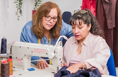 ladies using a sewing machine