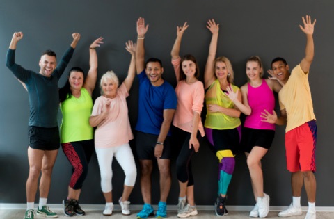 a group of people doing Zumba