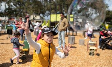 Child chasing a bubble