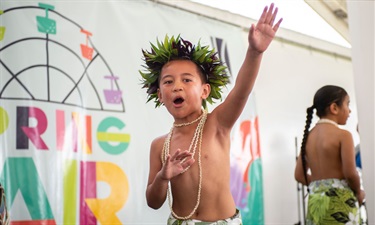 Child dancing on stage